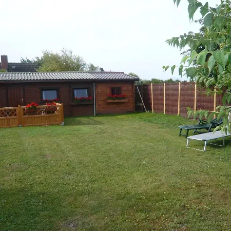 Feriehus Haus-Seerobbe-Blockhaus-Im-Garten *