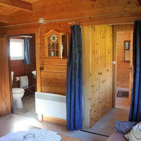 Feriehus Haus-Seerobbe-Blockhaus-Im-Garten Bojendorf