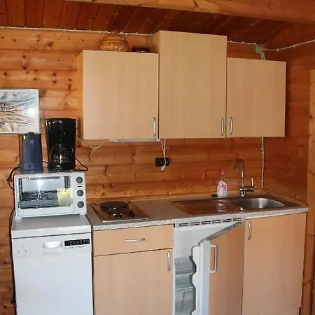 Feriehus Haus-Seerobbe-Blockhaus-Im-Garten